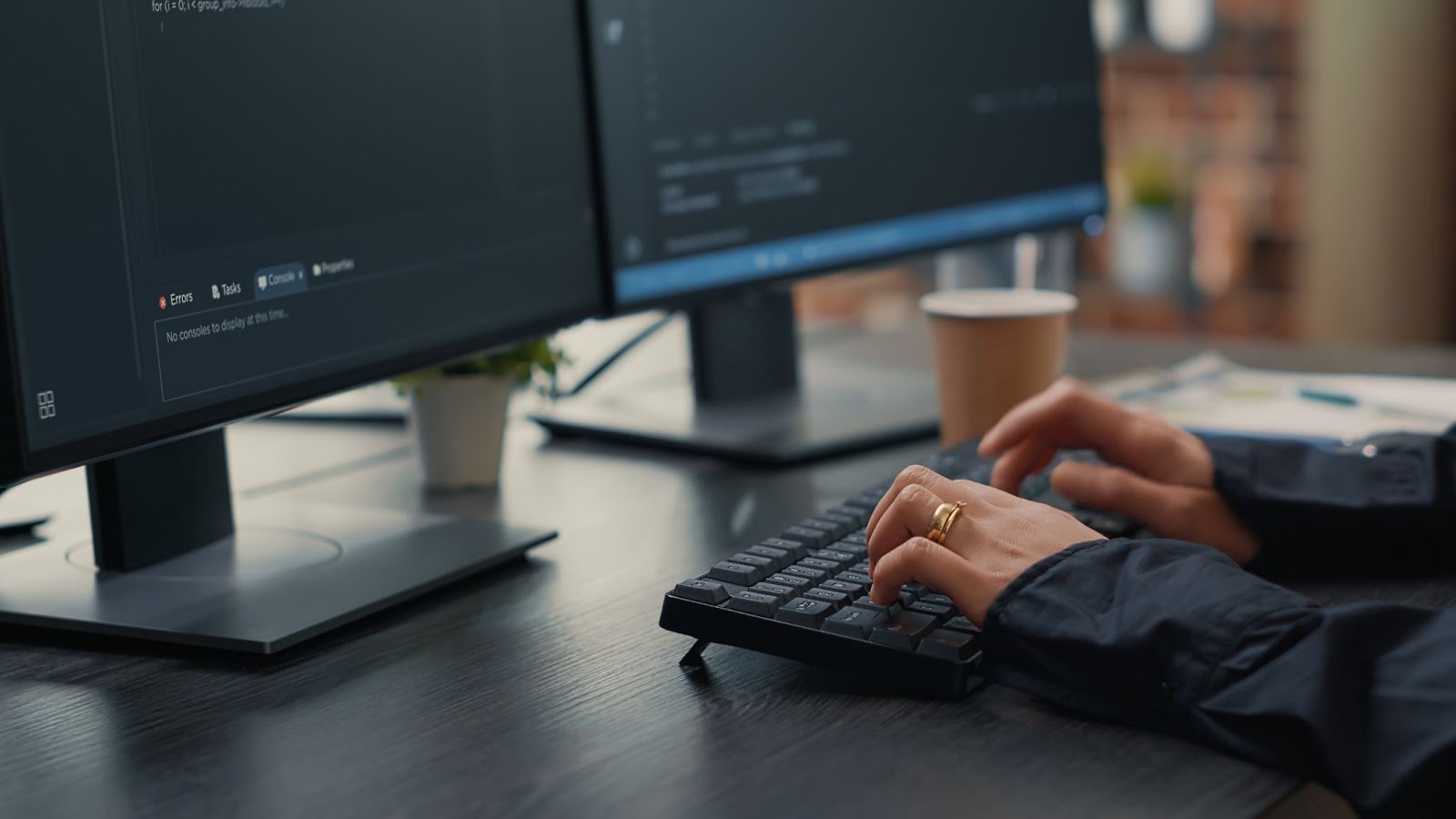 Close up of woman typing on keyboard